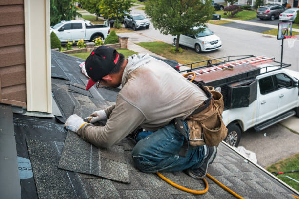 Professional Roofing technician working in West Minot, ME